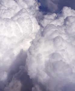 close-Clouds-view-through-airplane-window