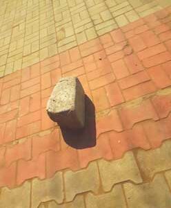 big-stone-with-its-shadow-lying-on-the-ground