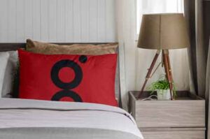 red-pillow-mock-up-on-bed