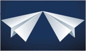 two-paper-plane-touching-nose-on-abstract-blue-background
