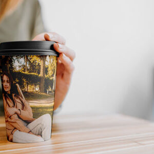 coffee-cup-with-hand-on-table-mock-up