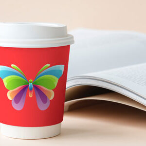 cup-on-desk-with-book-mock-up