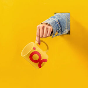 hanging-cup-in-woman-hand-mock-up