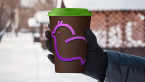 coffee-cup-mock-up-in-gloves-wear-hand