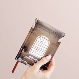 small-book-in-woman-hand-mock-up