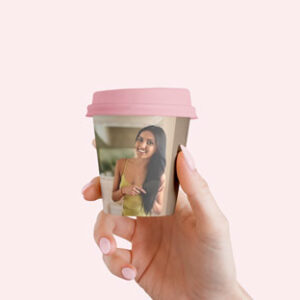 small-coffee-cup-in-woman-hand-mock-up