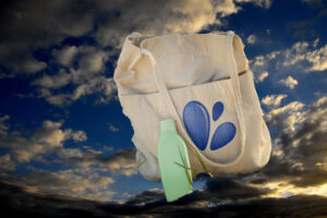 beach-bag-with-bottle-mockup-sand