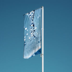 Flag Mockup on pole in blue sky