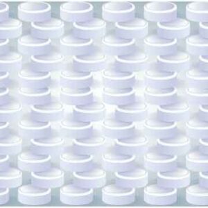 Several white tablet stack on white background