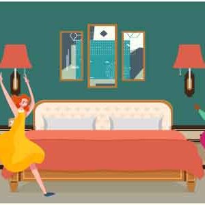 Young boy and girl dancing with joy in bedroom