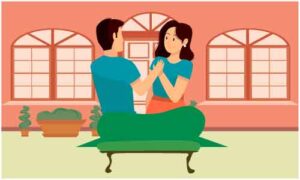 Young couple sit on mat behind chair in park