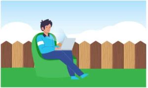 Young man sit on chair with laptop
