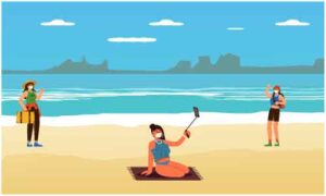Young girl wearing mask sit on mat at shore of sea taking selfie