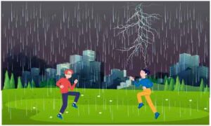 Boy and girl playing under rainfall in park near residential colony